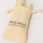 ORGANIC TERRA CO.® branded cotton muslin drawstring pouch containing natural sisal soap bags displaying From Nature To Your Body trademark on white background