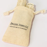 ORGANIC TERRA CO.® branded cotton muslin drawstring pouch containing natural sisal soap bags displaying From Nature To Your Body trademark on white background