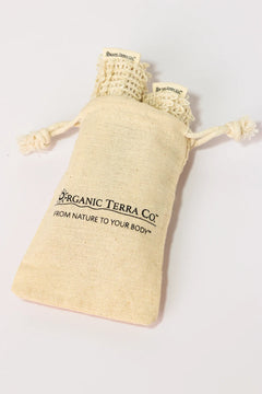 ORGANIC TERRA CO.® branded cotton muslin drawstring pouch containing natural sisal soap bags displaying From Nature To Your Body trademark on white background