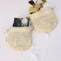 Two ORGANIC TERRA CO.®natural sisal soap exfoliating pouches on white background