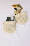 Two ORGANIC TERRA CO.®natural sisal soap exfoliating pouches on white background
