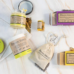 Organic Terra Co. Daily Collection contents — two botanical soap bars, 6.4 oz Botanical Butter, botanical lip balm and dried-lavender sachet
