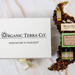 Organic Terra Co. Discovery Collection — white gift box with ribbon, botanical soap bar, 2.4 oz Botanical Butter and lip balm