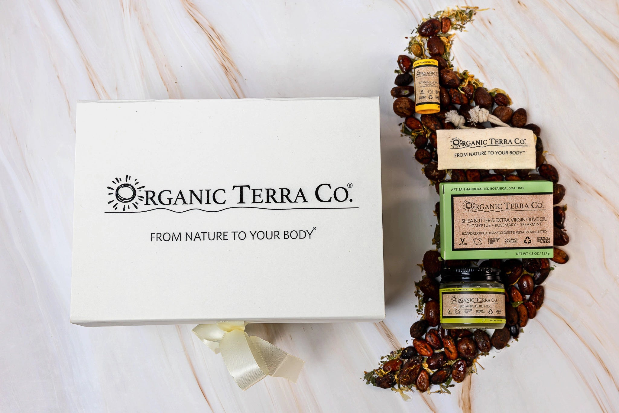 Organic Terra Co. Discovery Collection — white gift box with ribbon, botanical soap bar, 2.4 oz Botanical Butter and lip balm