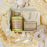 Organic Terra Co. Mama & Baby Collection contents — unscented botanical soap bar, 6.4 oz Botanical Butter, lip balm and lavender sachet
