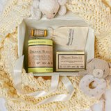 Organic Terra Co. Mama & Baby Collection contents — unscented botanical soap bar, 6.4 oz Botanical Butter, lip balm and lavender sachet
