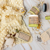 Organic Terra Co. Mama & Baby Collection contents — unscented botanical soap bar, 6.4 oz Botanical Butter, lip balm and lavender sachet